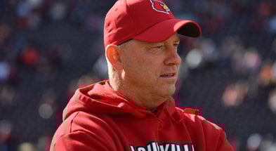 Nov 1, 2025; Blacksburg, Virginia, USA; Louisville Cardinals head coach Jeff Brohm looks on before the game against the Virginia Tech Hokies at Lane Stadium. Mandatory Credit: Brian Bishop-Imagn Images