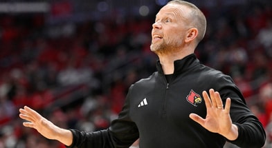 Nov 3, 2025; Louisville, Kentucky, USA; Louisville Cardinals head coach Pat Kelsey calls out instructions during the first half against the South Carolina State Bulldogs at KFC Yum! Center. Mandatory Credit: Jamie Rhodes-Imagn Images