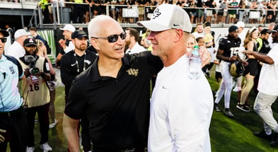 Terry Mohajir, Scott Frost | Photo by: Conor Kvatek (UCF Athletics)