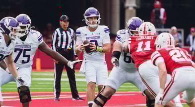 Northwestern Wildcats quarterback Preston Stone (8) looks to pass the ball against the Nebraska Cornhuskers during the fourth quarter at Memorial Stadium