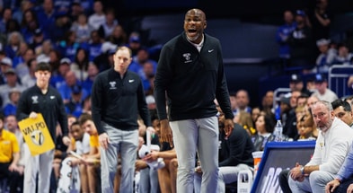 Nov 7, 2025; Lexington, Kentucky, USA; Valparaiso Beacons head coach Roger Powell instructs his team during the first half against the Kentucky Wildcats at Rupp Arena at Central Bank Center. Mandatory Credit: Jordan Prather-Imagn Images