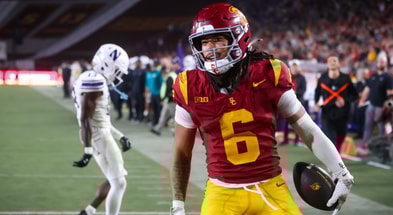USC wide receiver Makai Lemon scores a touchdown against Northwestern