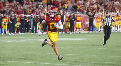 USC wide receiver Makai Lemon runs for a touchdown against Northwestern