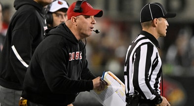 Nov 8, 2025; Louisville, Kentucky, USA; Louisville Cardinals head coach Jeff Brohm talks with an official during the second half against the California Golden Bears at L&N Federal Credit Union Stadium. California defeated Louisville 29-26. Mandatory Credit: Jamie Rhodes-Imagn Images