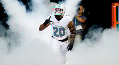 Nov 9, 2025; Miami Gardens, Florida, USA; Miami Dolphins linebacker Jordyn Brooks (20) runs on the field before a game against the Buffalo Bills at Hard Rock Stadium.
