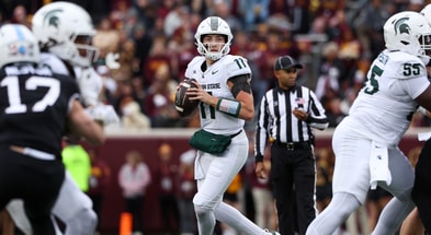 Michigan State Spartans quarterback Alessio Milivojevic (11) looks to pass against the Minnesota Golden Gophers during the first half at Huntington Bank Stadium. - Matt Krohn, USA TODAY Sports