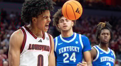 Louisville Cardinals guard Mikel Brown Jr. (0) celebrated after scoring and drawing a foul during the second half as the Louisville Cardinals hosted the Kentucky Wildcats at the KFC Yum! Center on Tuesday, Nov. 11, 2025. The Cardinals defeated the Wildcats 96-88.