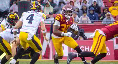 USC Trojans running back King Miller runs the ball against the Iowa Hawkeyes