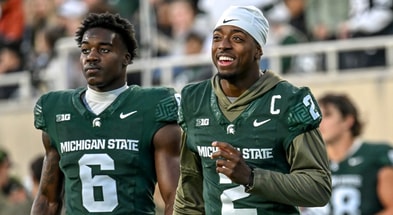 Michigan State's Aidan Chiles, right, and Nick Marsh walk to the locker room at halftime in the game against Penn State during the second quarter on Saturday, Nov. 15, 2025, at Spartan Stadium. - Nick King, USA TODAY Sports