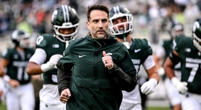 Michigan State's defensive coordinator Joe Rossi runs to the locker room before the game against Penn State on Saturday, Nov. 15, 2025, at Spartan Stadium in East Lansing. - Nick King, USA TODAY Sports.