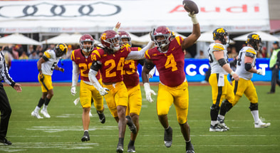 USC Trojans defensive tackle Jahkeem Stewart celebrates following an interception against Iowa