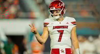 Oct 17, 2025; Miami Gardens, Florida, USA; Louisville Cardinals quarterback Miller Moss (7) reacts on the field against the Miami Hurricanes during the second quarter at Hard Rock Stadium. Mandatory Credit: Sam Navarro-Imagn Images