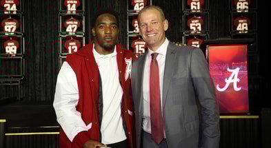 Alabama LB Justin Jefferson and coach Kalen DeBoer