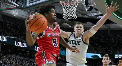 Michigan State Spartans forward Jaxon Kohler (0) defends Detroit Mercy Titans guard Orlando Lovejoy (5) during the first half at Jack Breslin Student Events Center. - Dale Young, USA TODAY Sports