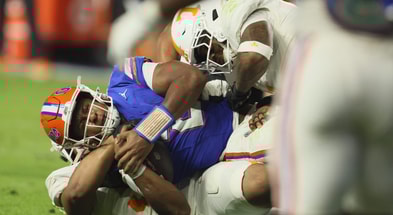 Florida quarterback DJ Lagway (2) gets sacked by Tennessee during the first half of an NCAA football game against Tennessee at Steve Spurrier Field at Ben Hill Griffin Stadium in Gainesville, FL on Saturday, November 22, 2025. [Alan Youngblood/Gainesville Sun]