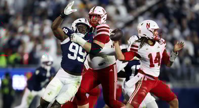 Nebraska football QB TJ Lateef (14) and OL Turner Corcoran against Penn State