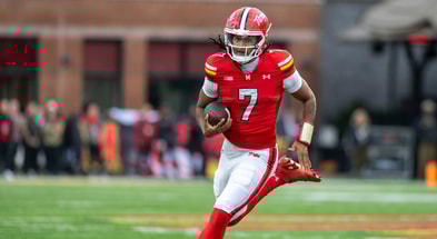 Maryland Terrapins quarterback Malik Washington (7) scrambles during the first quarter against the Michigan Wolverines at SECU Stadium. - Tommy Gilligan, USA TODAY Sports
