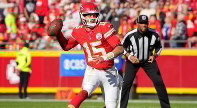 Nov 23, 2025; Kansas City, Missouri, USA; Kansas City Chiefs quarterback Patrick Mahomes (15) looks to pass against the Indianapolis Colts in the second quarter at GEHA Field at Arrowhead Stadium.
