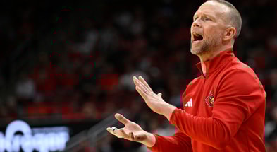 Nov 24, 2025; Louisville, Kentucky, USA; Louisville Cardinals head coach Pat Kelsey reacts during the second half against the Eastern Michigan Eagles at KFC Yum! Center. Louisville defeated Eastern Michigan 87-46. Mandatory Credit: Jamie Rhodes-Imagn Images