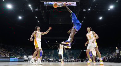 Nov 26, 2025; Las Vegas, NV, USA; Kansas Jayhawks forward Flory Bidunga (40) dunks the ball in the second half against the Tennessee Volunteers in the 2025 Players Era Festival third place game at MGM Grand Garden Arena. Mandatory Credit: Kirby Lee-Imagn Images