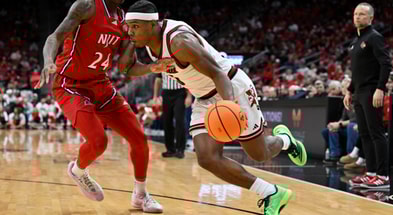 Nov 26, 2025; Louisville, Kentucky, USA; Louisville Cardinals guard Ryan Conwell (3) dribbles against NJIT Highlanders guard Ari Fulton (24) during the second half at KFC Yum! Center. Louisville defeated New Jersey Tech 104-47. Mandatory Credit: Jamie Rhodes-Imagn Images