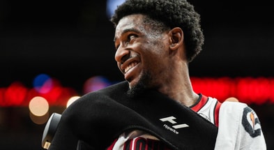 Louisville Cardinals guard Kobe Rodgers (11) smiles during a timeout in the game against Eastern Michigan. The Cards beat the Eagles 87-46 to improve to 6-0 Monday night, Nov. 24, 2025 at the KFC Yum! Center in Louisville, Kentucky.