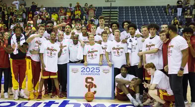 USC Trojans take a team photo after they defeated the Arizona State Sun Devils in the championship match at Lahaina Civic Center