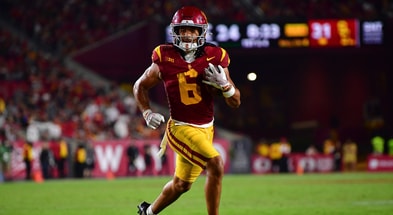 USC Trojans wide receiver Makai Lemon (6) runs for a touchdown against the Michigan State Spartans during the second half at the Los Angeles Memorial Coliseum
