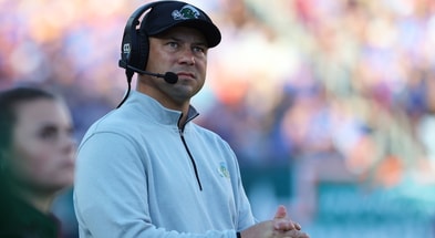 Dec 20, 2024; Tampa, FL, USA; Tulane Green Wave head coach Jon Sumrall looks on against the Florida Gators during the first quarter at Raymond James Stadium. Mandatory Credit: Kim Klement Neitzel-Imagn Images