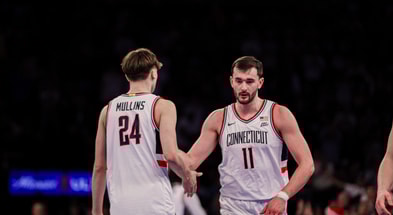 UConn basketball players Alex Karaban and Braylon Mullins