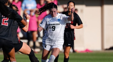 Michigan State's Kayla Briggs carries the ball in Friday's game against Stanford (photo courtesy of Michigan State women's soccer via Twitter).