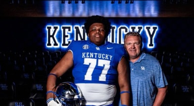 Cameron Miller with Kentucky offensive line coach Eric Wolford (Photo: UK Athletics)