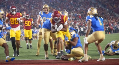 USC Trojans running back King Miller scores a touchdown against the UCLA Bruins