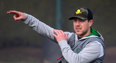 New Oregon offensive coordinator and quarterbacks coach Will Stein leads a drill on the first practice of spring for Oregon football as the Ducks prepare for the 2023 season. © Chris Pietsch/The Register-Guard / USA TODAY NETWORK