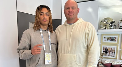 2026 safety Kealan Jones and Georgia Tech head coach Brent Key