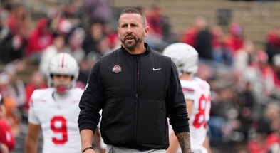 Ohio State Buckeyes offensive coordinator Brian Hartline leads warm ups prior to the NCAA football game against the Purdue Boilermakers at Ross-Ade Stadium in West Lafayette, Ind. on Nov. 8, 2025. © Adam Cairns/Columbus Dispatch / USA TODAY NETWORK via Imagn Images