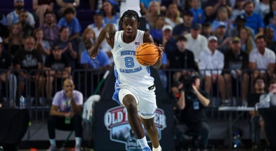 Nov 25, 2025; Fort Myers, Florida, USA; North Carolina Tar Heels forward Caleb Wilson (8) controls the ball against the St. Bonaventure Bonnies in the first half at Suncoast Credit Union Arena. Mandatory Credit: Nathan Ray Seebeck-Imagn Images