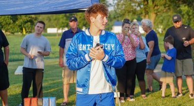 Moeller's Matt Ponatoski speaks to his family and friends after verbally committing to the University of Kentucky - © Brendan Connelly/ The Enquirer / USA TODAY NETWORK via Imagn Images