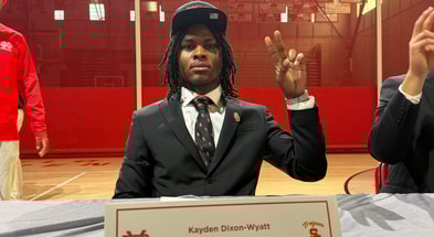 Kayden Dixon-Wyatt flashes the fight on after signing with the USC Trojans on national signing day