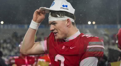Baylor's Briggs Cherry (3) puts his championship hat on his head during the Division II-AAA championship game at Finley Stadium in Chattanooga, Tenn., on Dec. 4, 2025.