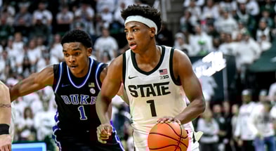 Michigan State's Jeremy Fears Jr., right, moves the ball as Duke's Caleb Foster defends during the second half on Saturday, Dec. 6, 2025, at the Breslin Center in East Lansing. - Nick King, USA TODAY Sports