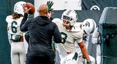 Michigan State defensive back Jeremiah Hughes, center, runs a drill during football practice on Tuesday, April 8, 2025, in East Lansing. - Nick King, USA TODAY Sports