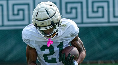 Michigan State's Tracy Revels (21) runs the ball at practice Tuesday, Aug. 5, 2025. - Robert Killips, USA TODAY Sports