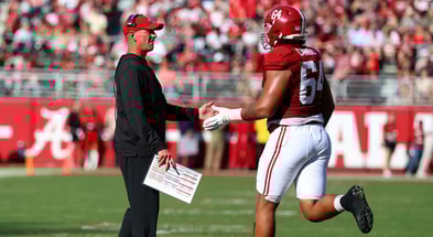 Alabama coach Kalen DeBoer and OL Michael Carroll