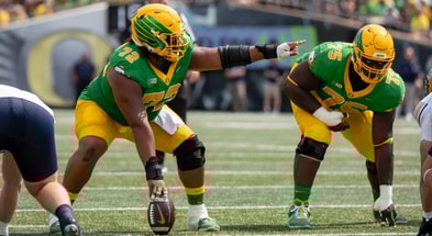 Oregon offensive linemen Iapani Laloulu, left, and Emmanuel Pregnon line up for the Ducks, via Ben Lonergan:The Register-Guard : USA TODAY NETWORK via Imagn Images