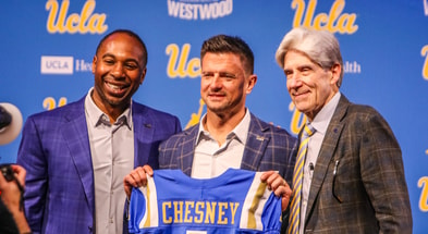 UCLA head coach Bob Chesney, AD Martin Jarmond and chancellor Julio Frenk