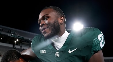 Michigan State Spartans edge Tyler Gillison celebrates beating the Western Michigan Broncos at Spartan Stadium. - Brendan Mullin, USA TODAY Sports