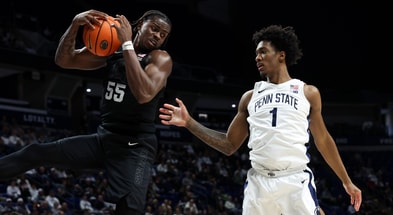 Michigan State Spartans forward Coen Carr (55) jumps for the rebound during the first half against the Penn State Nittany Lions at Bryce Jordan Center. - Matthew O'Haren, USA TODAY Sports