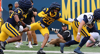 West Virginia safety Jason Cross