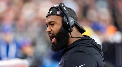Nov 23, 2025; Glendale, Arizona, USA; Arizona Cardinals defensive line coach Winston DeLattiboudere III against the Jacksonville Jaguars at State Farm Stadium. Credit: Mark J. Rebilas-Imagn Images